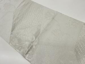 切り嵌め風花唐草に荒波・花菱模様織出し袋帯